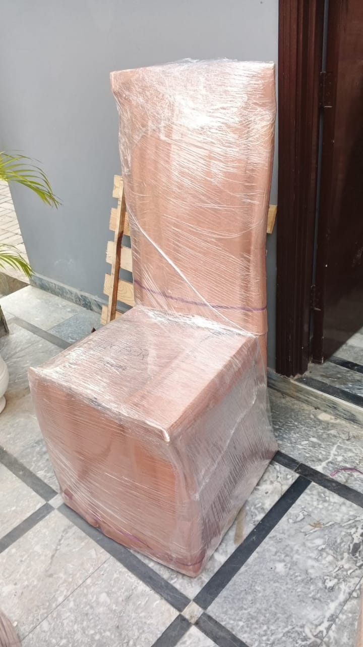 Furniture carefully wrapped for moving by Aneesa Packers and Movers